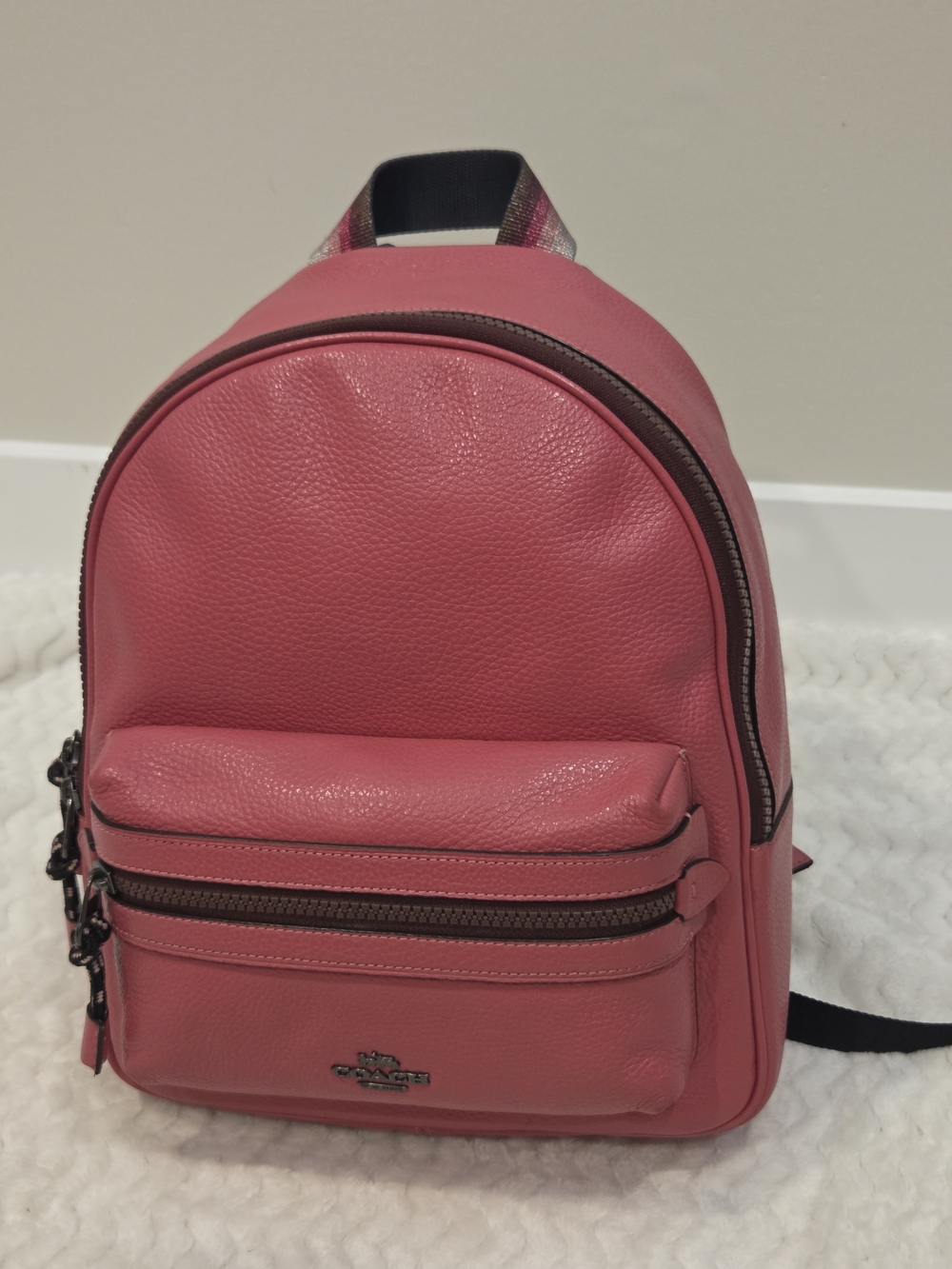 Coach Jordyn Pebbled Leather Mini Backpack in Magenta/Hot Pink